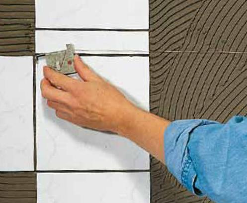 Autre procédé pratique pour l’ajustement des carreaux : l’emploi du cordeau Autre procédé pratique pour l’ajustement des carreaux : l’emploi du cordeau
